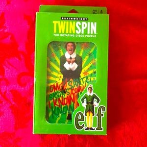 Buddy the Elf Brainwright Twinspin the rotating discs puzzles handheld game